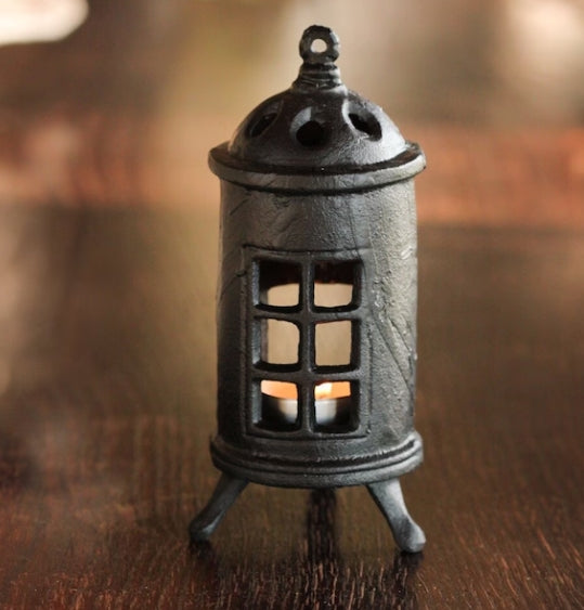 Kamin för värmeljus