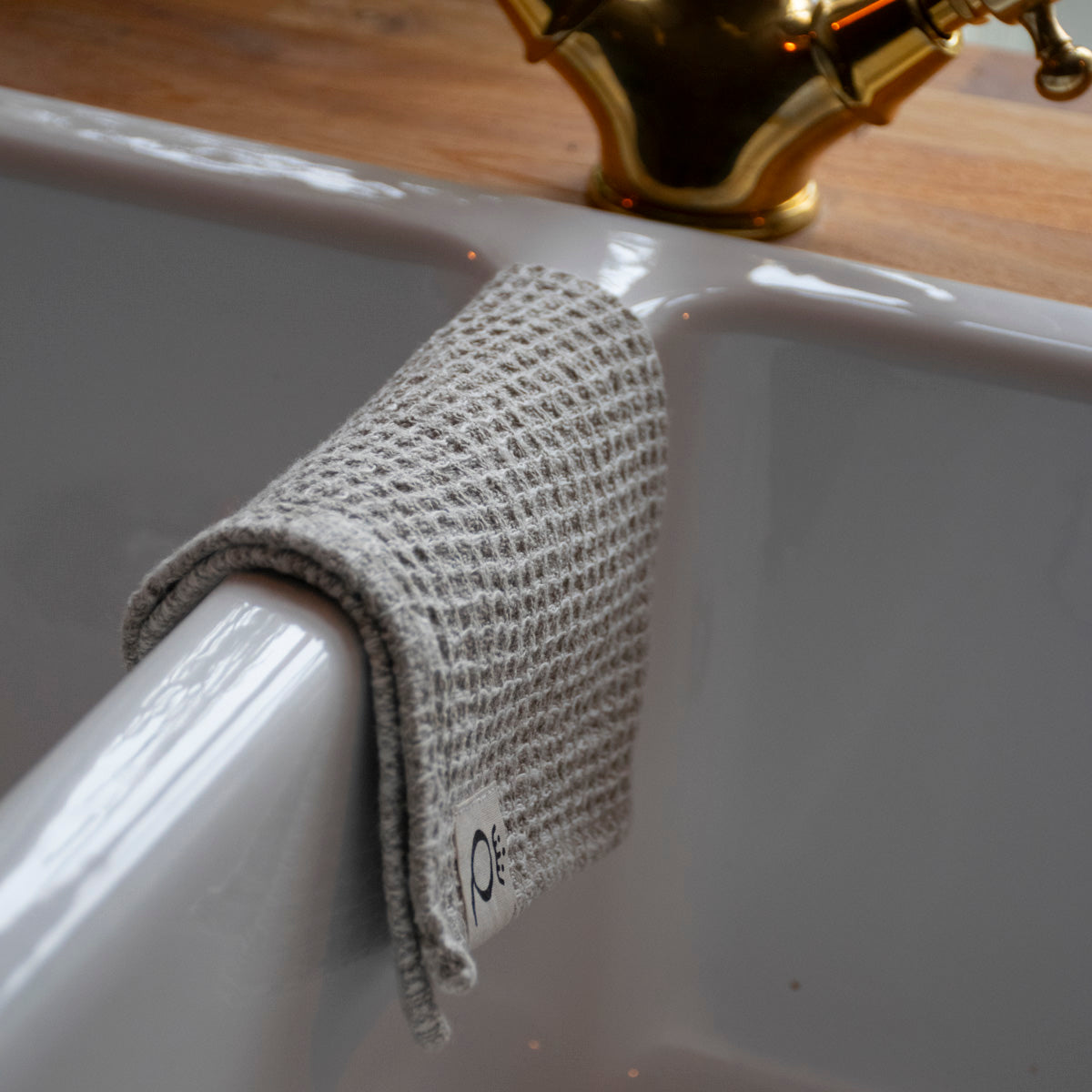 Våfflad disktrasa i linne Qvesarum 26x26 cm