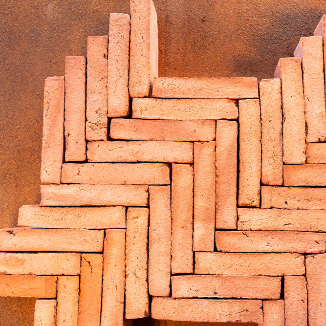 Bodenziegel Fischgrätenmuster rot