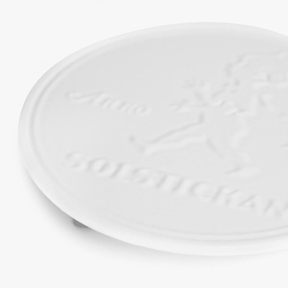 Solstickan Topfuntersetzer aus weißem Gusseisen