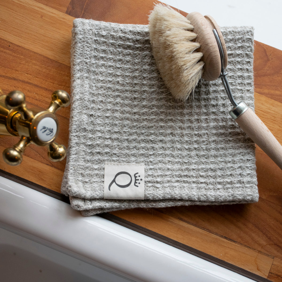 Våfflad disktrasa i linne Qvesarum 26x26 cm