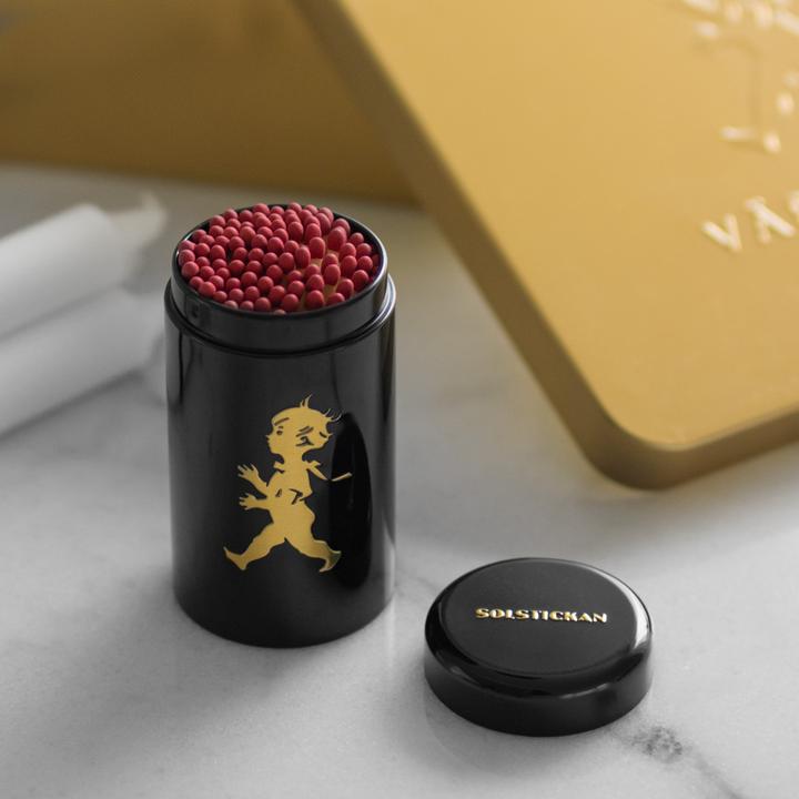 Streichholzdose Solstickan schwarz/gold
